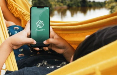 kid looking at chatgpt on hammock